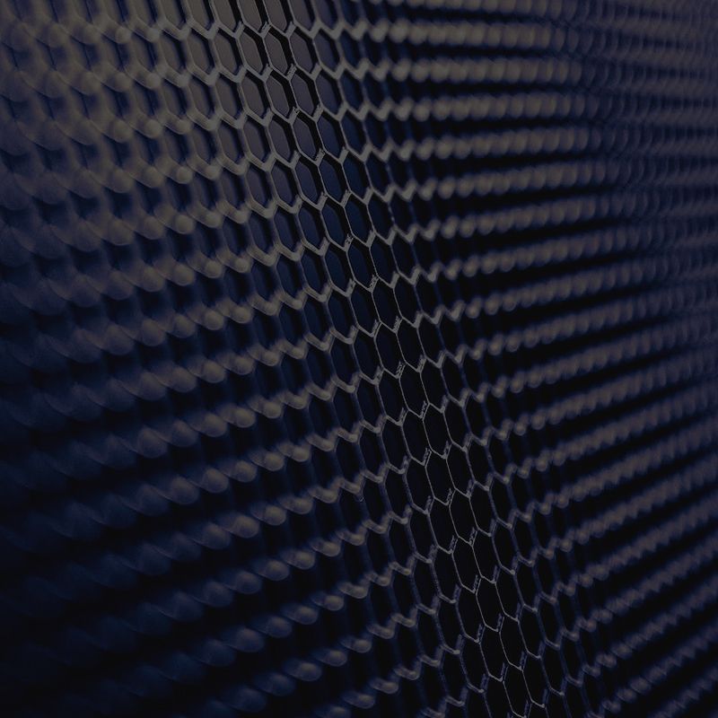 Ein schwarzer Hintergrund mit einem Muster aus sechseckigen Formen.