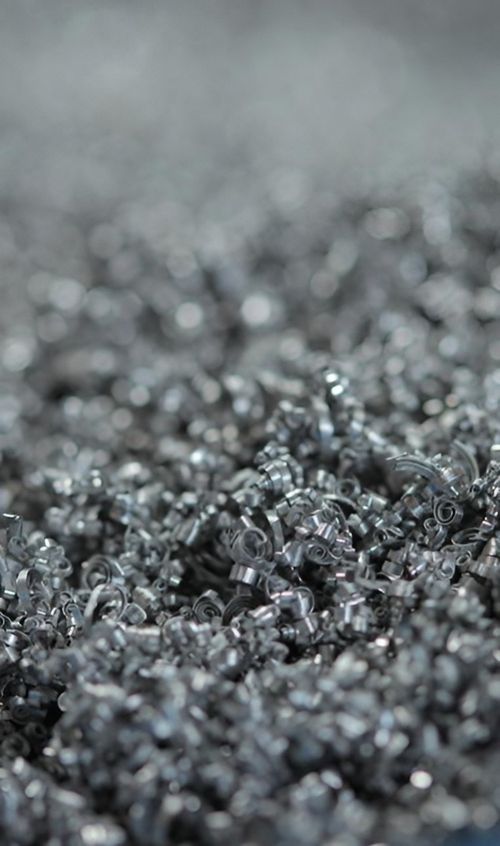 Ansammlung von schwarzen Metallspänen, die chaotisch aufeinanderliegen.