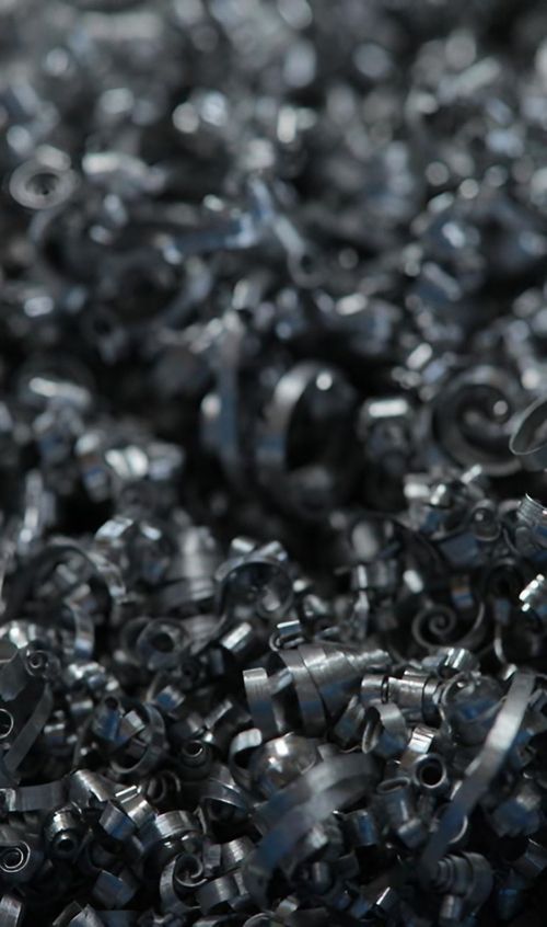Ansammlung von schwarzen Metallspänen, die chaotisch aufeinanderliegen.